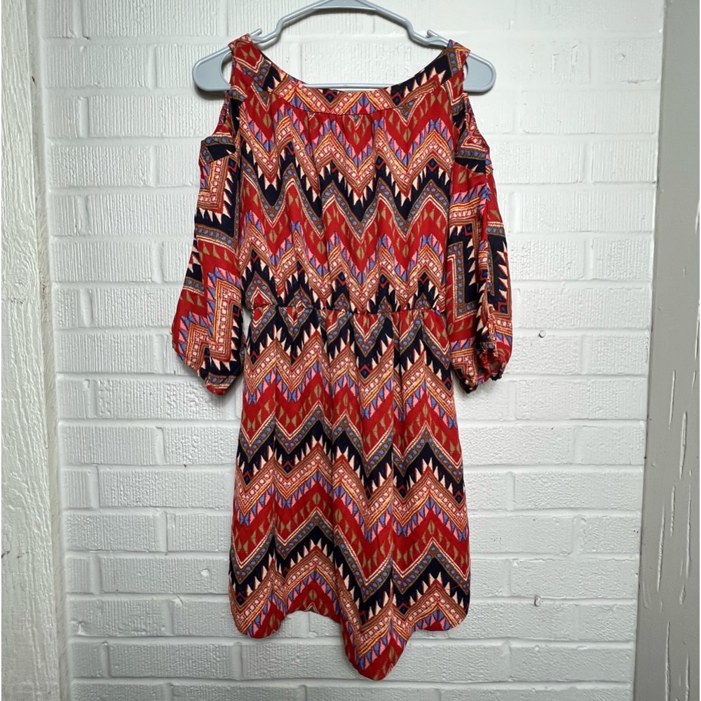 Xtaren dress multi color with shoulder cut out size M